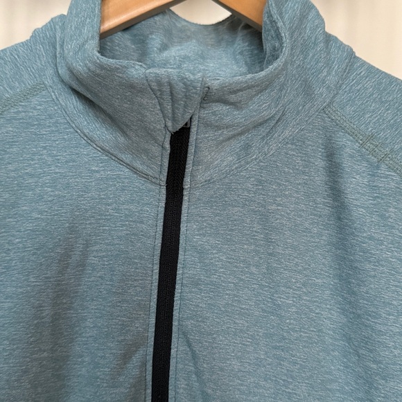 Lululemon Surge Warm 1/2 Zip size Large
Blue - Picture 4 of 10
